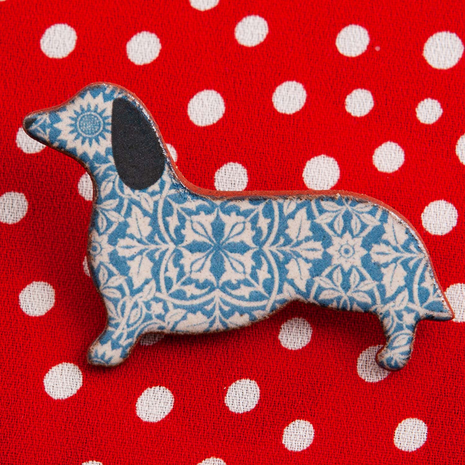 Dog Lover Gifts available at Dog Krazy Gifts – Ceramic Blue William Morris Dachshund Brooch by Mary Goldberg of Stockwell Ceramics, Just Part Of Our Collection Of Daxie Themed Gifts, Available At www.dogkrazygifts.co.uk